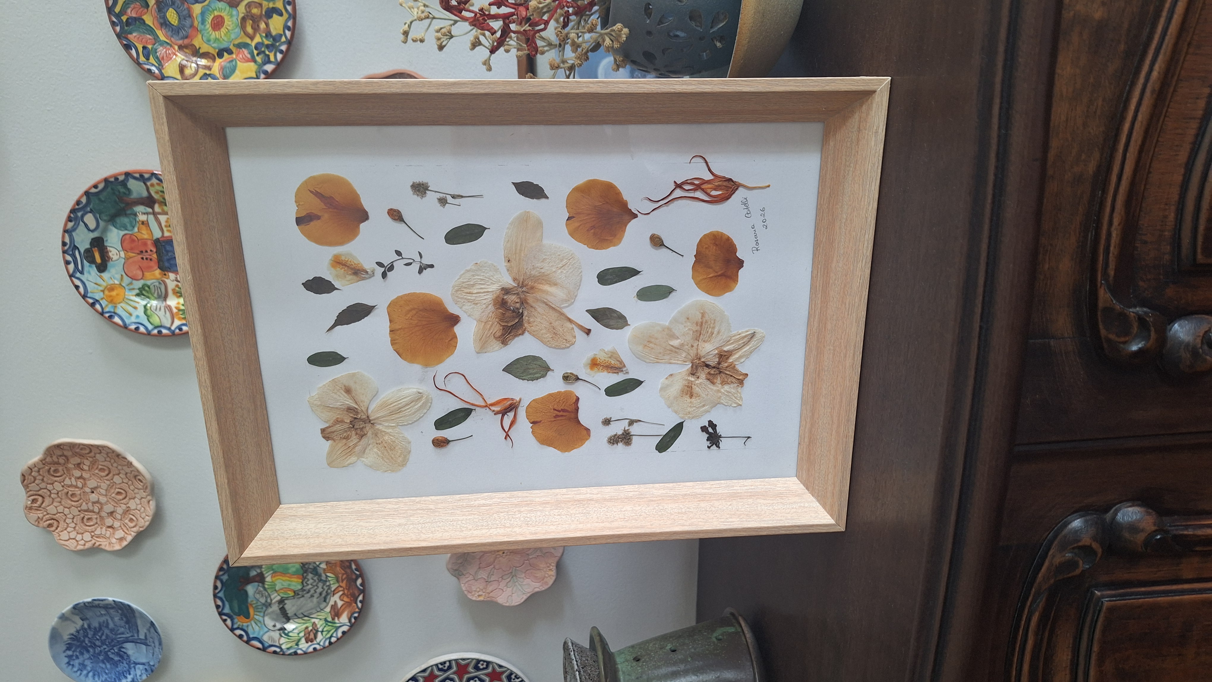 Quadro de flores e folhas secas
