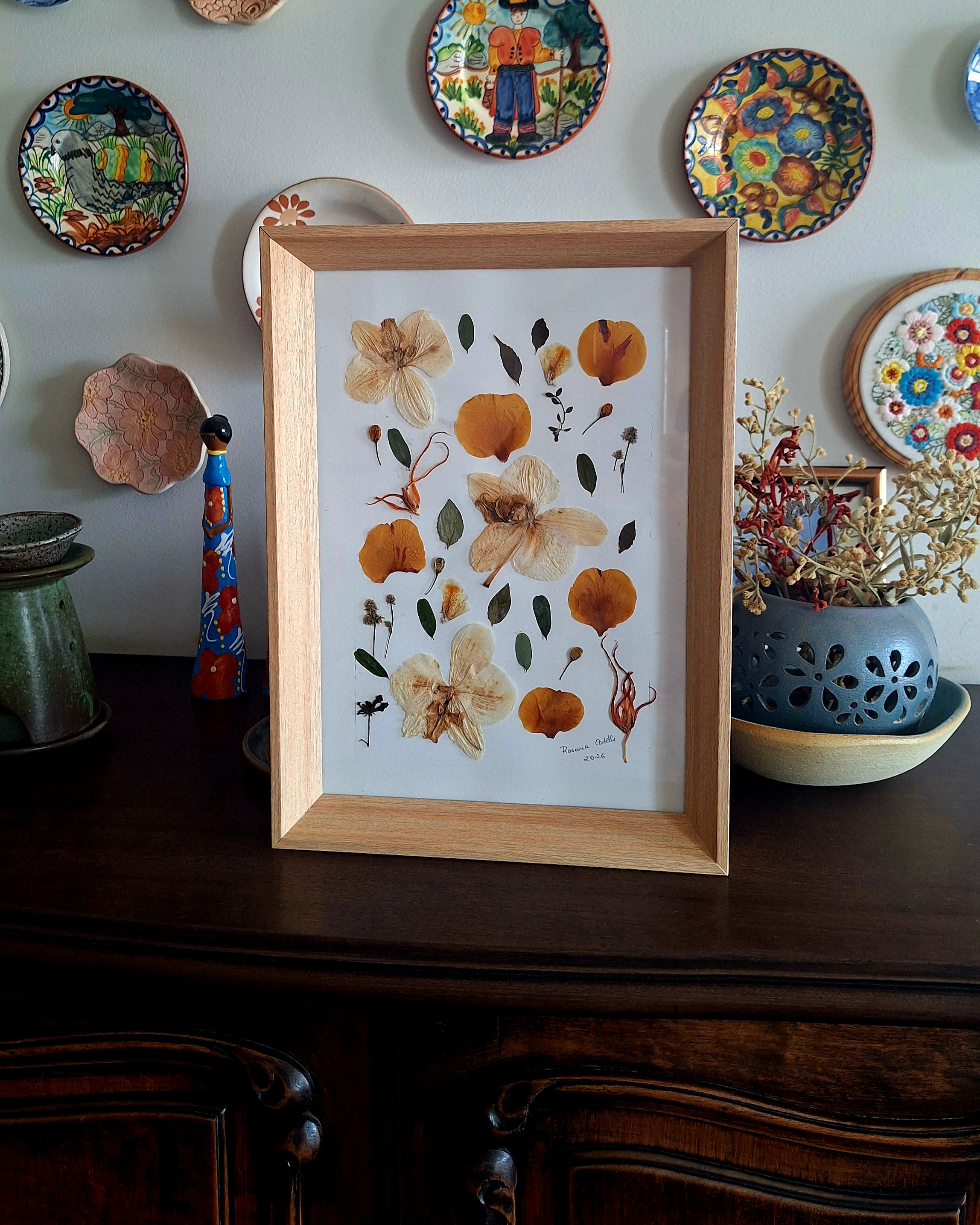 Quadro de flores e folhas secas